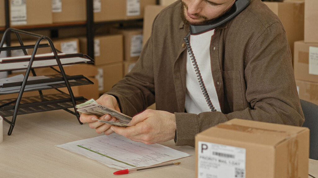 logistics account executive working on desk